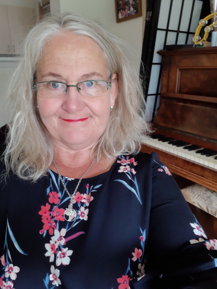 A selfie of customer Sharon with her piano.